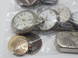 many different types of pocket watches in a bag