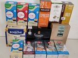 several boxes of coffee are stacked on top of each other