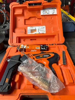 a tool in the orange case on the floor