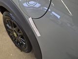 a close up of a car with a sticker on it
