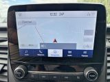 a car dashboard with a gps device on it