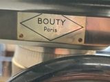 a close up of a coffee grinder on a table