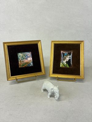 deux photos encadrées représentant un chat et un éléphant