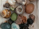 a box full of different types of rocks and stones