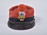 a red hat with a gold star on it