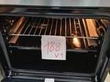 a sign on the door of an oven that is not open