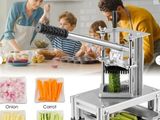 a picture of a vegetable slicer with a family in the background