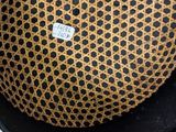 a black hat with a brown and black pattern on it