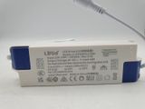 a white box with a blue lid and a white cord