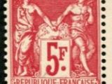 a stamp with a picture of two women shaking hands