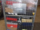 a metal cart with many items in it