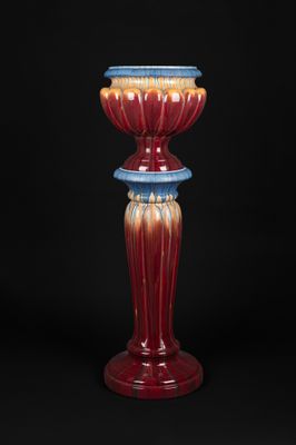 an image of a red and blue vase on a black background