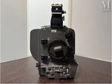 an old camera sitting on a table in a room