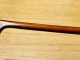 a close up of a wooden handle on a table