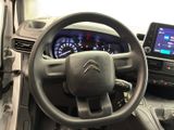 the interior of a car with a steering wheel, dashboard, and dash board