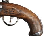 a close up of a gun on a white background with a white background