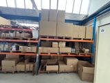 many boxes and boxes on the shelves in the warehouse