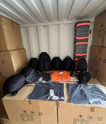 many bags of luggage sitting in the back of a truck