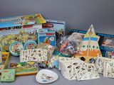a lot of children ' s toys and games on the table