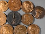 a lot of coins that are sitting on a table