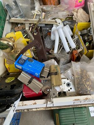 a box full of assorted items sitting on the floor