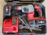 two tools that are in a case on the floor