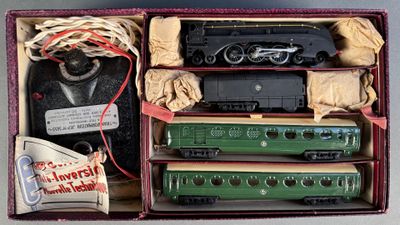 a box with a train set in it on a table