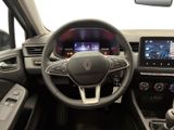 the interior of a car with a steering wheel, dashboard, and dash board