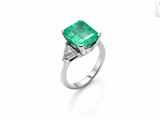 an emerald and diamond ring