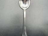a spoon that is sitting on a table