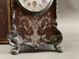 a clock that is sitting on top of a table