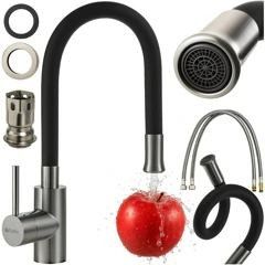 un gros plan d'un robinet de cuisine avec une pomme rouge