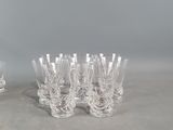 a lot of glasses that are sitting on a table