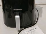 a black blender sitting on a table with a price tag