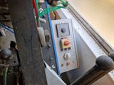 a control panel on the side of a window sill