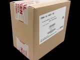 a box that is sitting on a black surface