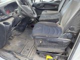 an image of the inside of a car with the door open
