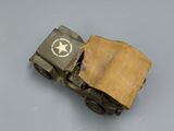an old toy army vehicle with a star on the side