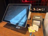 a desktop computer sitting on top of a wooden desk