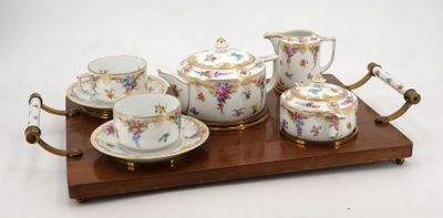 a picture of a tea set on a wooden tray