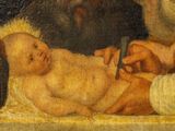 painting of a baby in a manger being examined by a doctor