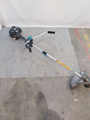a small machine that is sitting on the ground