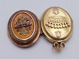 an image of a gold locke with a cross on it