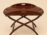an image of a wooden tray on a stand with handles