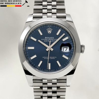 the blue dial on the rolex watch is very attractive