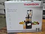 a box that has a blender in it on a table