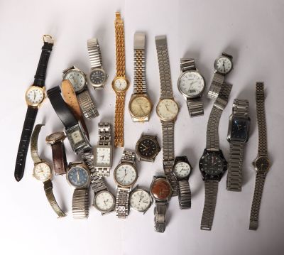 a lot of watches that are sitting on a table