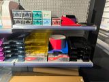 many items on the shelves in the store for sale
