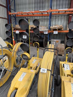 many different types of hoses in a warehouse