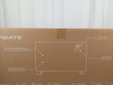 a cardboard box with a drawing of a computer on it